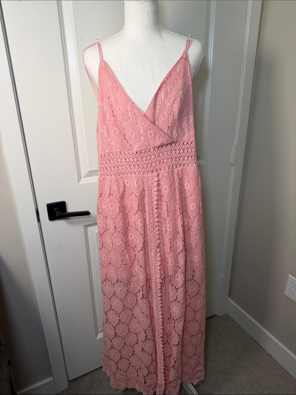 Sleeveless Pink Lace Maxi Dress with Smocked Waist and shorts.